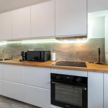 Apartment Mohost Dany - Cozy High-rise Getaway With Balcony